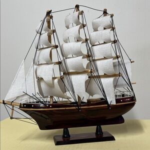 Elegant White and Brown Model Ship Decor